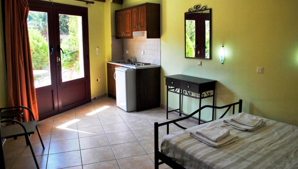 Argo Apartments Vasilikí Rum bild
